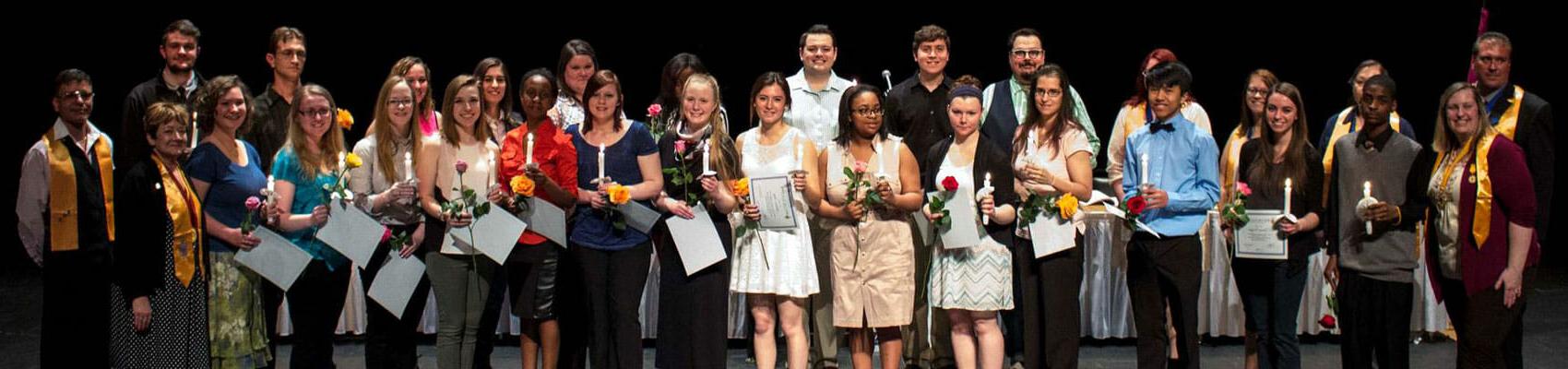 PTK students on stage at awards ceremony