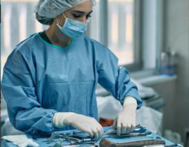woman in surgical gown and equipment